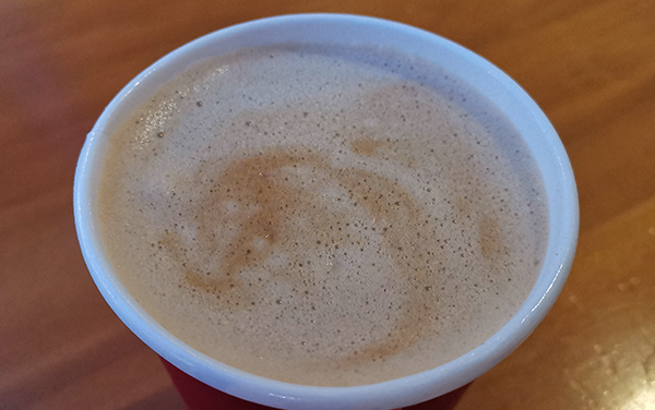 Latte Caliente : Cafetería Juan Valdez